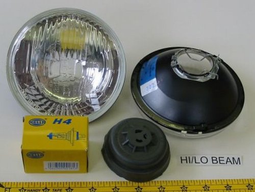 Hella 5 3/4 Round E Code H4 Halogen Replacement Headlight Kit with 60/55W H4 Bulbs Headlight Bulbs HELLA H5006A
