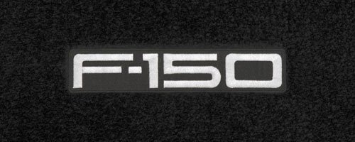 Logo 1999-1999 Ford F-150 SuperCab Mid-level Custom 1 Pc Front Mat Mid-Level Cruiser Mat Color: Smoke Mat Logo: F150 Silver Letters Applique Custom Fit Cruiser Mats CL1947-MC04-1YUBY:M233:L2CN