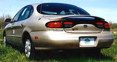 Ford Taurus Rear Spoiler 1996 1997 1998 1999 - Painted - FL Toreador Red Metallic Body Razzi C_Razzi-767-73N_4